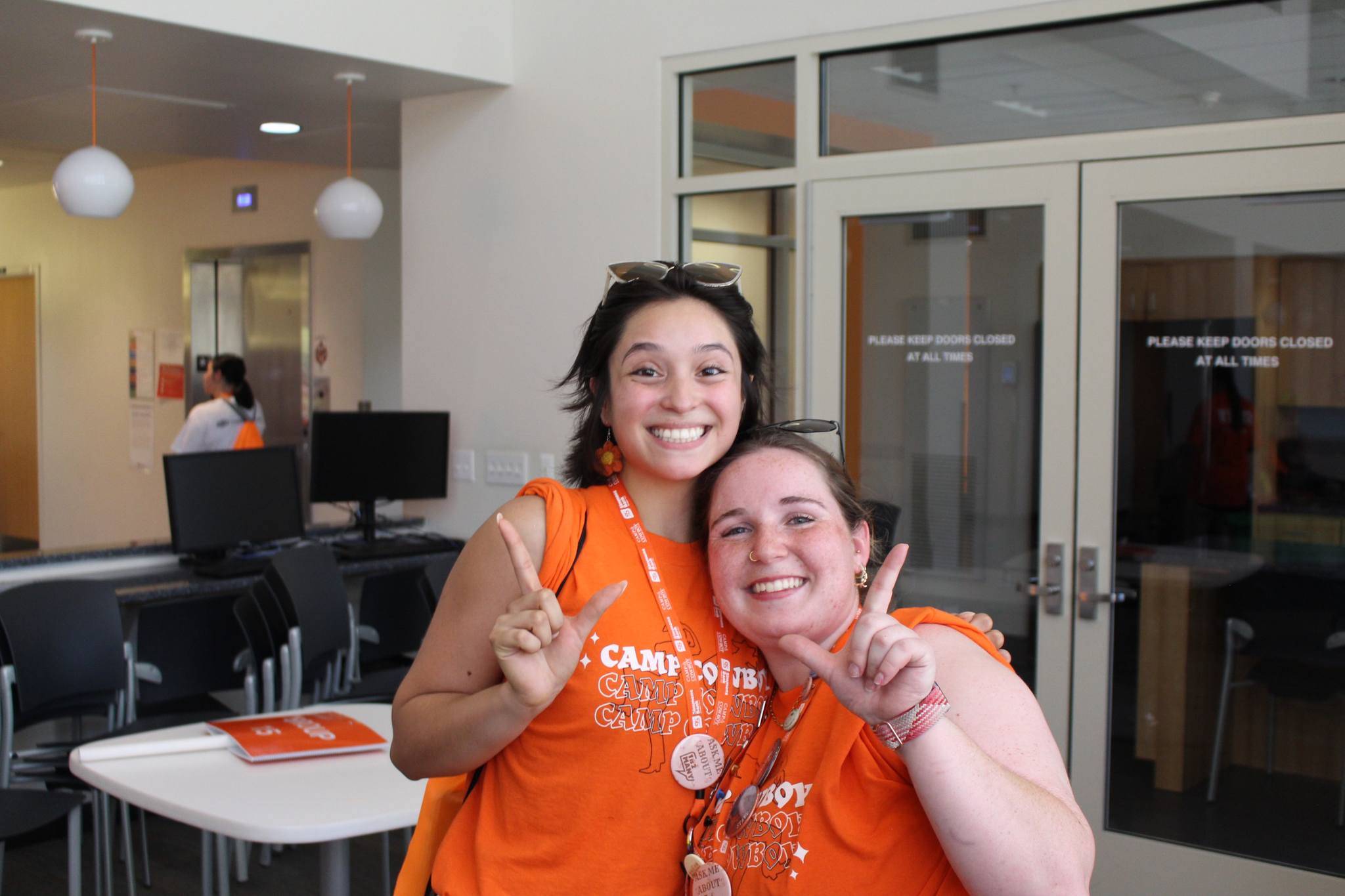 Two camp staff posing for photo