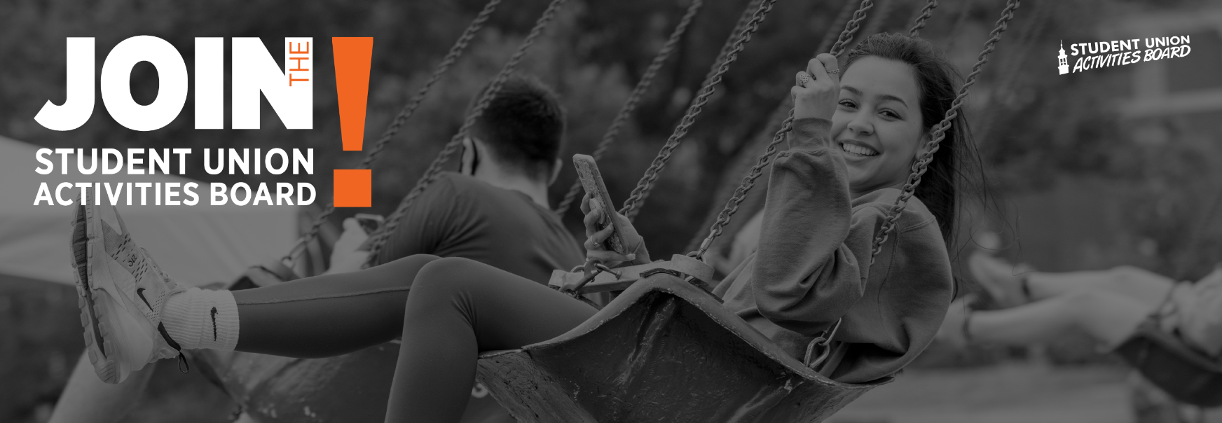 Student at SUAB Carnival on a swing