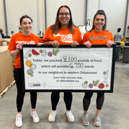 Student helping the Stillwater Firefighters